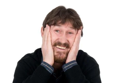 The joyful bearded man with hands on cheeks Stock Photos