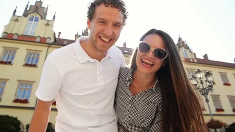 Joyful Couple with Charming Smiles Posing Outdoors Looking at the Camera During Stock Footage 82159086