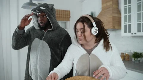 Joyful couple having fun dancing and playing fool Stock Footage 148685823