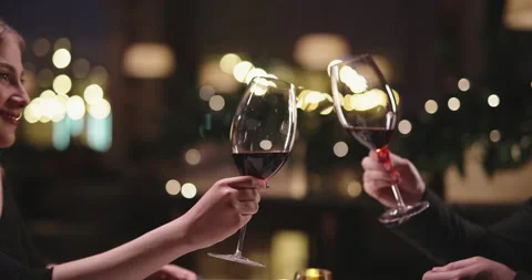 Joyful couple having a romantic dinner at a fancy restaurant. People enjoying Видео 151480573