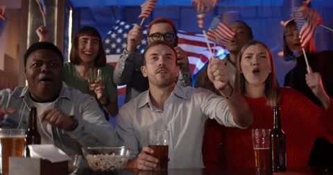 Joyful diverse people waving american flags and chanting while supporting Stock Footage