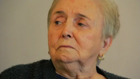 Joyful eldery woman smiling to camera Stock-Footage 107584751