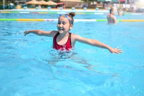 Joyful fun in the pool Stock Photos