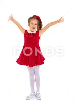Joyful girl with arms raised. Stock Photos