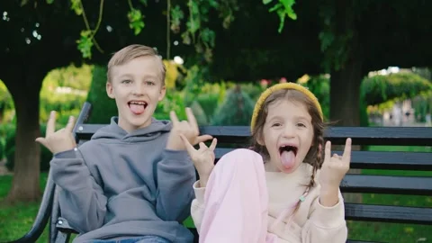 A joyful group of children is having a blast making silly faces while playing in Stock Footage 289287510