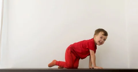 Joyful kid playing in studio Video stock 119781118