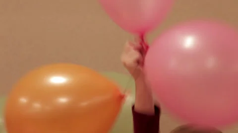 Joyful kids dancing with balloons Stock Footage 35258265