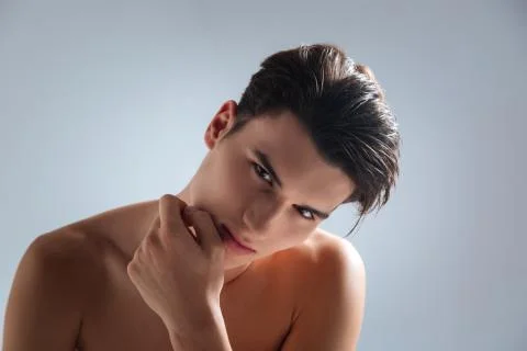 Joyful man posing on camera Stock Photos