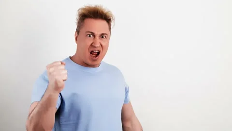 Joyful man screaming Yes raising his fists, winner gesture. Excited guy Stock Footage 235366434