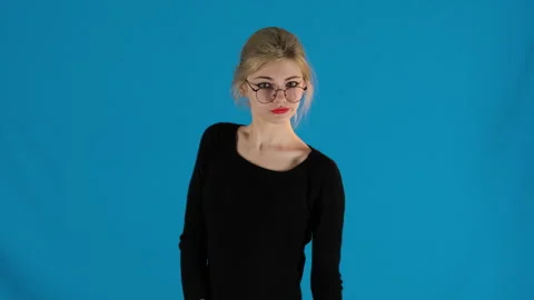 Joyful model dancing in front of camera moving arms Stock Footage 306472383