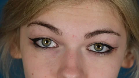 Joyful model shifts expression from serious to perky Stock Footage 287983789