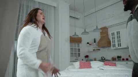 Joyful multiracial couple dancing in funny pajamas Stock-Footage 148682661