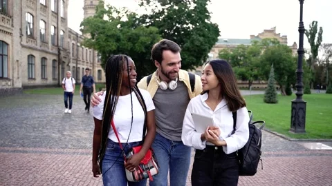 Joyful multiracial students spending time outdoor 库存影片 163280953