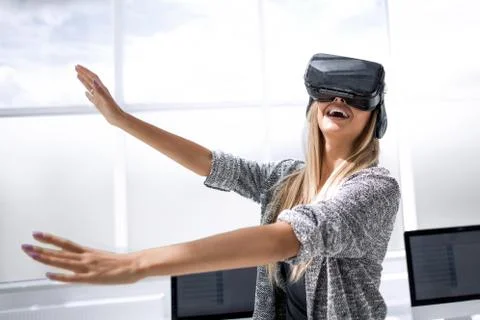 Joyful nice woman while testing new technologies Stock Photos