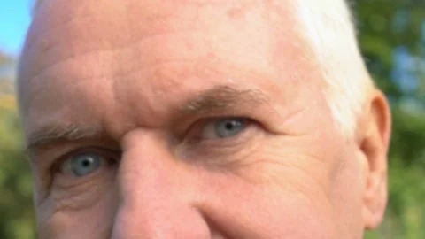 Joyful old man looking camera outdoors, blurred vision, nearsightedness problem Stock-Footage 118990916