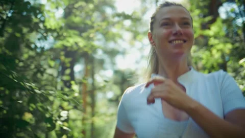 Joyful runner in forest, sunlight, nature, fitness, freedom, health, outdoor, Stock Footage 346662712