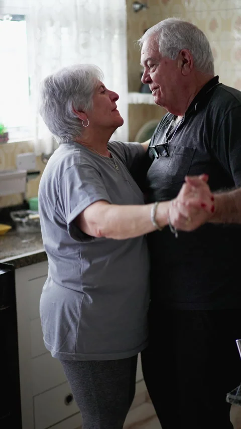 https://images.pond5.com/joyful-senior-couple-dancing-home-footage-244302674_iconl.jpeg