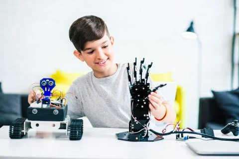 Joyful smart boy preparing for engineering classes Stock Photos