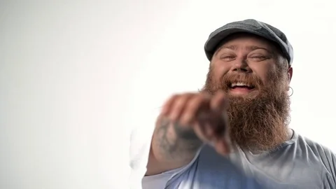 Joyful thick guy having fun while speaking Stock Footage 81520276