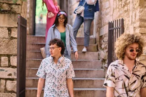 Joyful Tourists Exploring a Mediterranean Foto stock