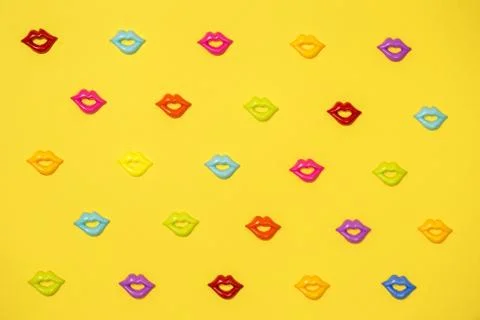 Joyful yellow pattern of colorful lips Stock Photos