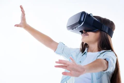 Joyful young girl testing virtual technology Stock Photos
