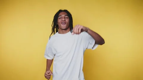 Joyful Young Man Celebrating with Dreadlocks Stock Footage 315162894