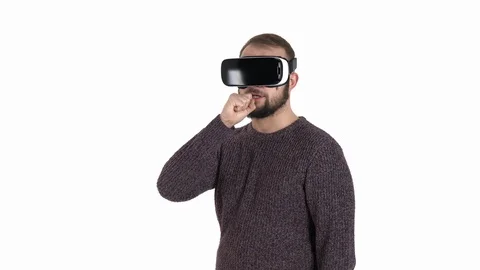 Joyful young man in virtual reality glasses having fun and singing. Stock Footage 121194610
