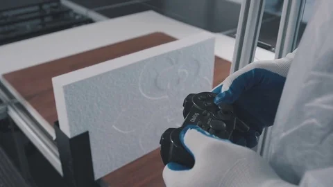 Joystick automatic control machine for cutting foam polystyrene Stock Footage 73937351