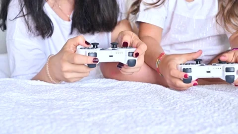 Joystick for a computer game in the hands of a child, close-up. A little girl Stock Footage 138225970