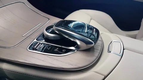 Joystick control media panel of the car. auto interior Stock Footage 104146463
