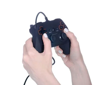 Joystick game controller in hand Stock Photos