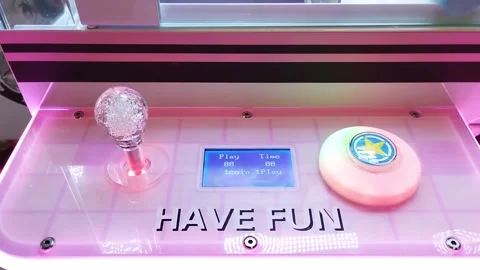 The joystick stick of a game machine, in the game center. Colorful and bright. Stock Footage 247930800