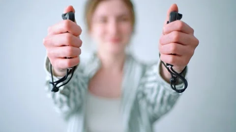 Joystick in women's hands. Game controllers for virtual reality. Happy woman Stock Footage 131018939