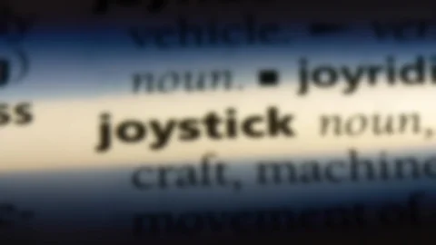 Joystick word in a dictionary. Stock Footage 99561802