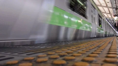 JR (Japan Railways) train arriving in Shinjuku station in Tokyo Stock Footage 74088717