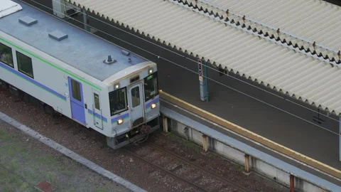 JR train departing platform at early morning, Hakodate, Japan, 2026.09.10. Stock Footage 345426688