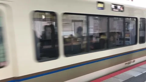 JR Train Leaving Station Stock Footage 137739274
