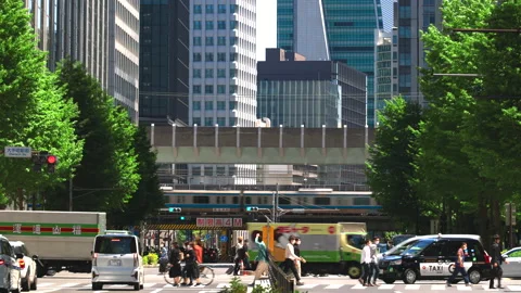JR train runs on the elevated railway tracks in Otemachi  Tokyo Japan. Video stock 213093794