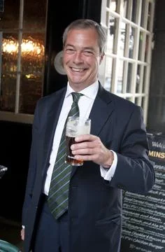A Jubilant Nigel Farage Sinks His First Pints Of The Day In The Westminster Arms Stock Photos