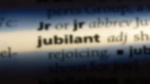 Jubilant word in a dictionary. Video stock 99561814