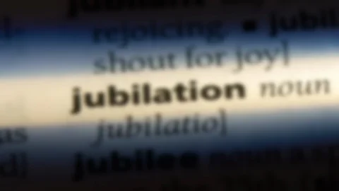 Jubilation word in a dictionary. Stock Footage 99561816