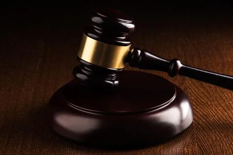 Judge hammer on the table Stock Photos