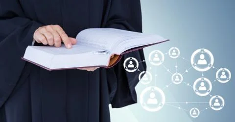 Judge mid section with open book against blue background with white network 写真素材