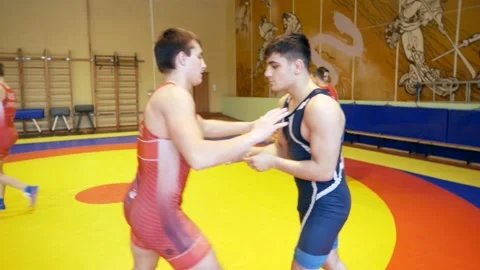 Judoists show captures and throws on each other Stock Footage 185437988