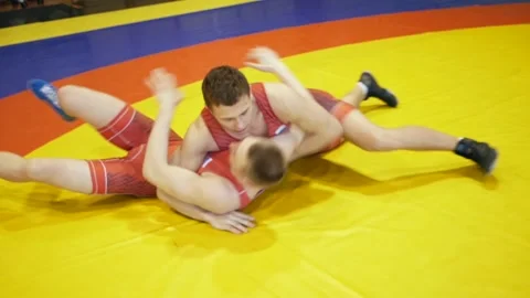 Judoists show captures and throws on each other Stock Footage 185438194