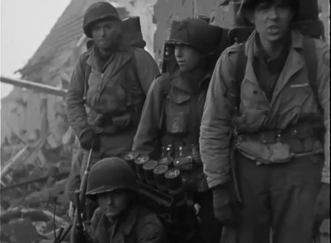 JUELICH, GERMANY - 1945: Ammunition rest - Soldiers rest by shell rack Stock-Footage 344599098