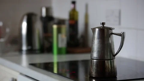Jug of coffee on a hob Stock Footage 70891522