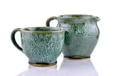 Jug with cup Stock Photos