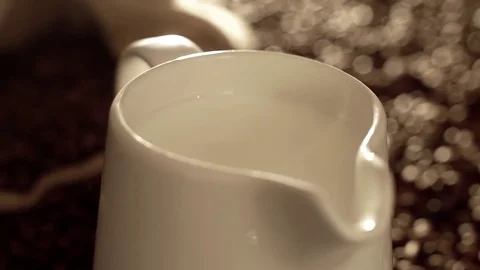 Jug with milk in slow motion Stock Footage 76100464